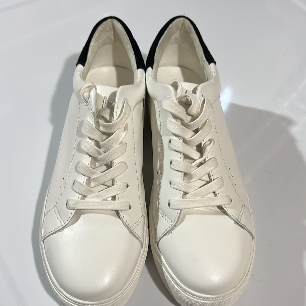 Kurt Geiger white sneakers.